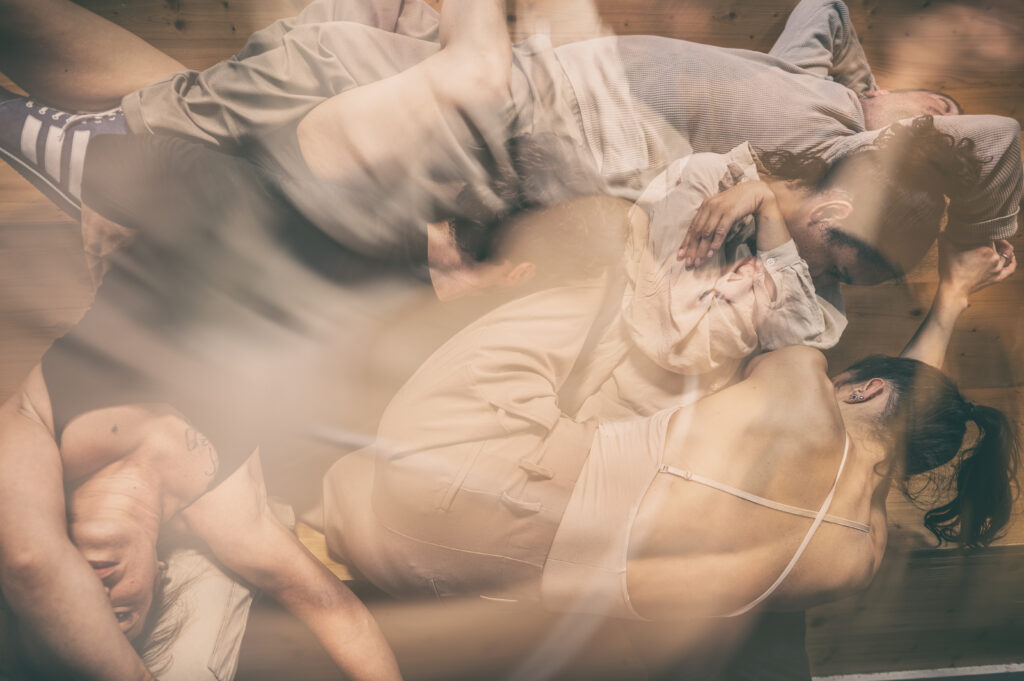 Abstract image of dancers' bodies overlapping