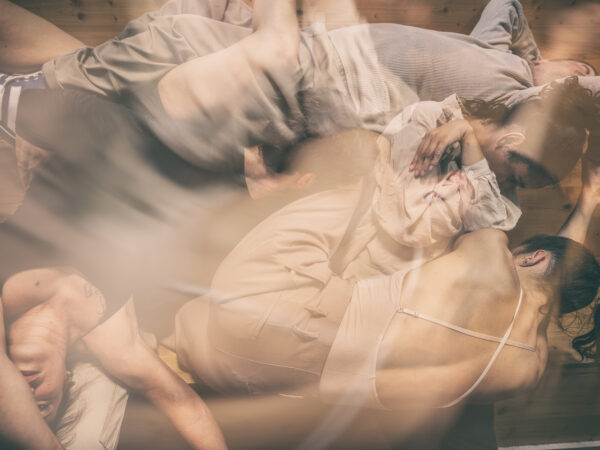 Abstract image of dancers' bodies overlapping